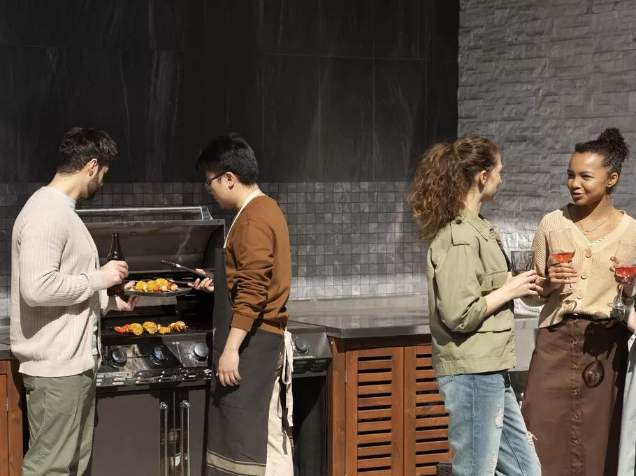 medium-shot-friends-making-barbecue.jpg