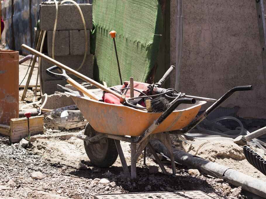 5a4e2618_construction-site-with-barrow-filled-with-tools.jpg
